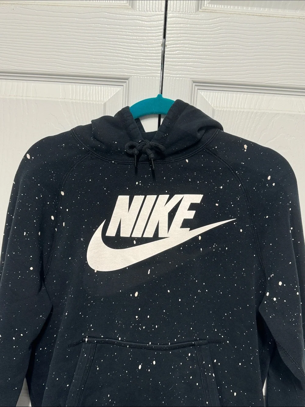 Nike Black Pullover Hoodie with White Swoosh and Paint Speckle